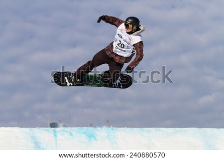 ISTANBUL, TURKEY - DECEMBER 20, 2014: Lucien Koch jump in FIS Snowboard World Cup Big Air. This is first Big Air event for both, men and women.
