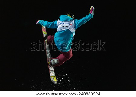 ISTANBUL, TURKEY - DECEMBER 20, 2014: Cheryl Maas jump in FIS Snowboard World Cup Big Air. This is first Big Air event for both, men and women.