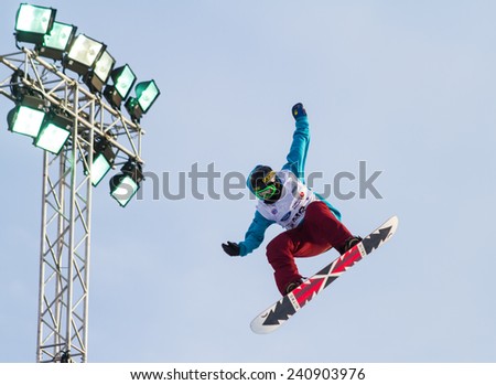 ISTANBUL, TURKEY - DECEMBER 20, 2014: Cheryl Maas jump in FIS Snowboard World Cup Big Air. This is first Big Air event for both, men and women.