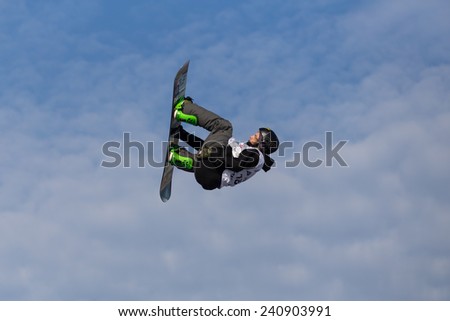 ISTANBUL, TURKEY - DECEMBER 20, 2014: Aljosa Krivec jump in FIS Snowboard World Cup Big Air. This is first Big Air event for both, men and women.