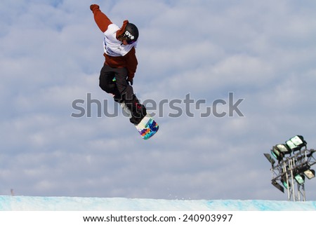 ISTANBUL, TURKEY - DECEMBER 20, 2014: Andrew Matthews jump in FIS Snowboard World Cup Big Air. This is first Big Air event for both, men and women.