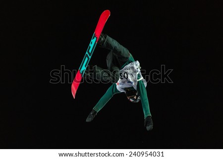 ISTANBUL, TURKEY - DECEMBER 20, 2014: Jonas Boesiger jump in FIS Snowboard World Cup Big Air. This is first Big Air event for both, men and women.