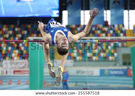 ISTANBUL, TURKEY - FEBRUARY 21, 2015: Greek athlete Georgios Tessaromatis high jump during Balkan Athletics Indoor Championships in Asli Cakir Alptekin Athletics hall.