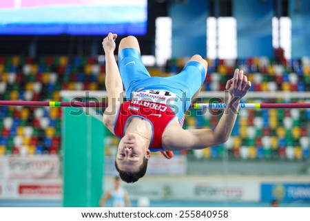 ISTANBUL, TURKEY - FEBRUARY 21, 2015: Croatian athlete Alen Melon high jump during Balkan Athletics Indoor Championships in Asli Cakir Alptekin Athletics hall.