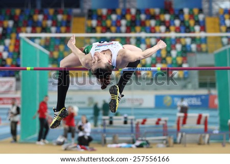 ISTANBUL, TURKEY - FEBRUARY 21, 2015: Bulgarian athlete Venelina Veneva Mateeva high jump during Balkan Athletics Indoor Championships in Asli Cakir Alptekin Athletics hall.