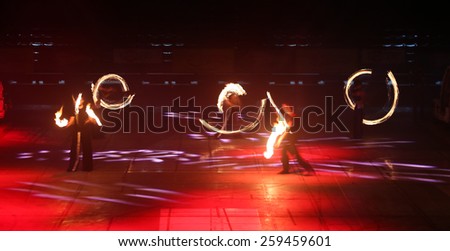 ISTANBUL, TURKEY - JANUARY 31, 2015: People performs fire show during Monster Hot Wheels in Sinan Erdem Dome.