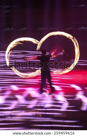 ISTANBUL, TURKEY - JANUARY 31, 2015: People performs fire show during Monster Hot Wheels in Sinan Erdem Dome.