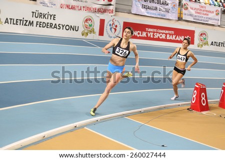 ISTANBUL, TURKEY - FEBRUARY 14, 2015: Athletes run during Turkcell Juniors and Seniors Athletics Turkey Indoor Championship in Asli Cakir Alptekin Athletics hall