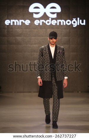 ISTANBUL, TURKEY - MARCH 17, 2015: A model showcases one of the latest creations by Emre Erdemoglu in Mercedes-Benz Fashion Week Istanbul