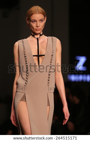 ISTANBUL, TURKEY - MARCH 19, 2015: A model showcases one of the latest creations by Zeynep Tosun in Mercedes-Benz Fashion Week Istanbul