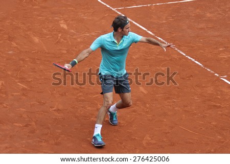 ISTANBUL, TURKEY - MAY 02, 2015: Swiss player Roger Federer in action during semi final match against Argentine player Diego Schwartzman in TEB BNP Paribas Istanbul Open 2015