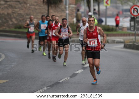 ISTANBUL, TURKEY - APRIL 26, 2015: Athletes are running in Old Town streets of Istanbul during Vodafone 10th Istanbul Half Marathon