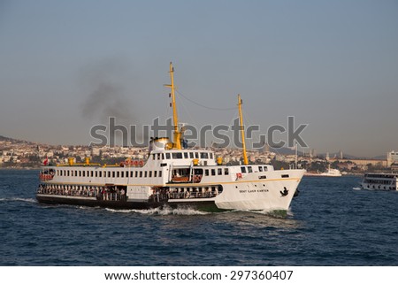 ISTANBUL, TURKEY - APRIL 12, 2015: Sehir Hatlari ferry passing from Asian side to European side of Istanbul. Sehir Hatlari was established in 1844 and now carry 150,000 passengers a day.