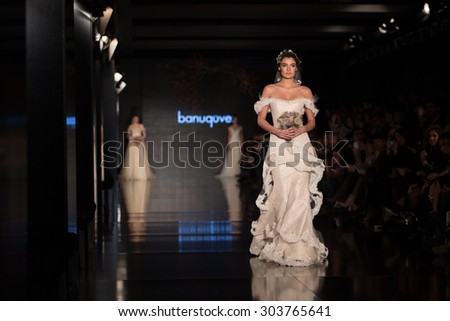 ISTANBUL, TURKEY - NOVEMBER 22, 2014: A model showcases one of the latest creations by Banu Guven in Fashionist fashion fair