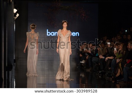 ISTANBUL, TURKEY - NOVEMBER 22, 2014: A model showcases one of the latest creations by Banu Guven in Fashionist fashion fair