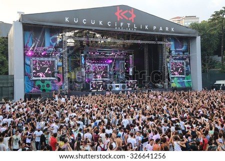 ISTANBUL, TURKEY - AUGUST 01, 2015: People have fun in Life in Color the Big Bang tour in Istanbul Kurucesme Arena