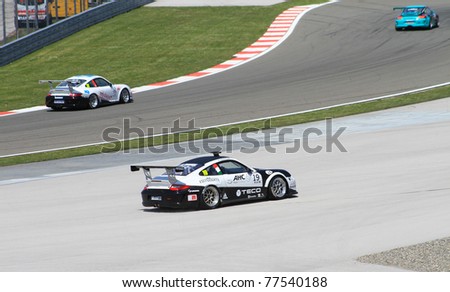 ISTANBUL - MAY 08: Team Bleekemolen driver Alessandro Zampedri goes off track during the Porsche Mobil 1 Supercup Race 2 in Istanbul Park on May 08, 2011 in Istanbul, Turkey