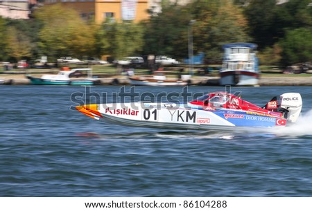 ISTANBUL, TURKEY - SEPTEMBER 18: Saruhan TAN drives YKM Sport Offshore 225 boat during World Offshore 225 Championship, Halic stage on September 18, 2011 in Istanbul, Turkey