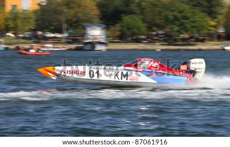 ISTANBUL, TURKEY - SEPTEMBER 18: Saruhan TAN drives YKM Sport Offshore 225 boat during World Offshore 225 Championship, Halic stage on September 18, 2011 in Istanbul, Turkey