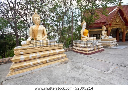 triple meditation buddha statue in thai temple