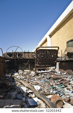 stock photo Interior of an abandoned old rusty car filled with rubbish