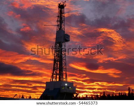 Drilling rig with morning sky