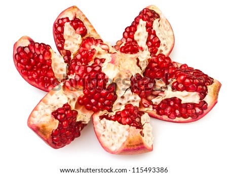 pomegranate cut open on white background