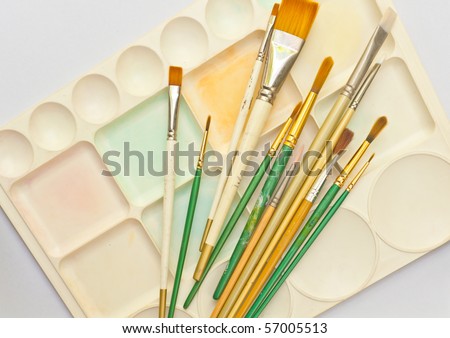 paintbrushes and palette isolation