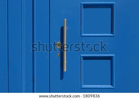 Door of dark blue colour. Close up
