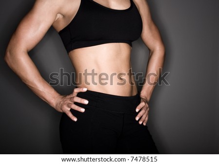 Toned female body builder