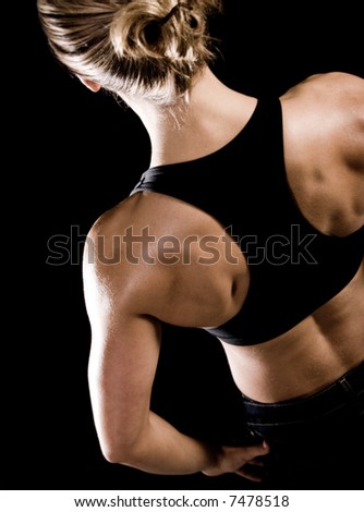 Toned female body builder\'s back