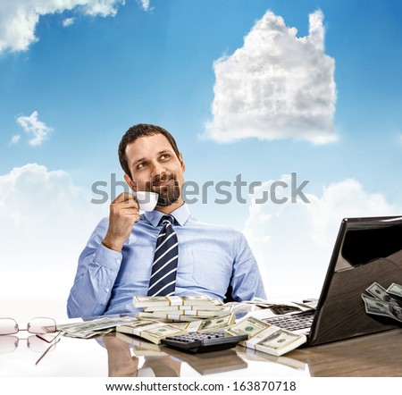 Daydreaming businessman with a cup of tea with head in the clouds / man hold cup of tea day dreaming looking up