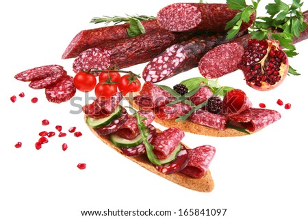 Sliced salami / studio photography of sliced food - isolated over white background