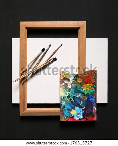 Oil painting set / studio photography of paint utensils on black background