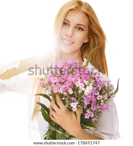 International Women\'s Day (8 March) / portrait of young woman holding bouquet of flowers in her hands on white background