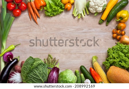 Healthy eating background / studio photography of different fruits and vegetables on wooden table