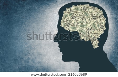 Money and your brain / outline of a man\'s head with the brain in the shape of money