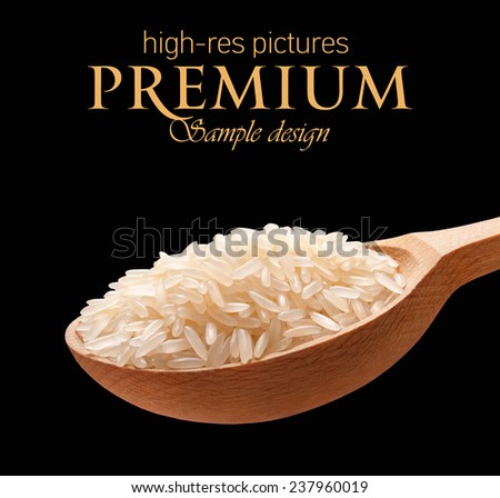 Rice in a wooden spoon / cereal on wooden spoons isolated on black background with place for your text