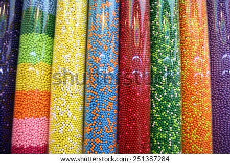 Candy Shop / photography of transparent plastic tubes full of thousands of colorful candies