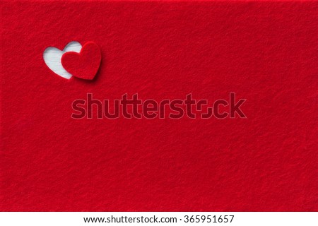 Felt Background for design to Valentine's Day. Decorative heart from red felt. View from above. Valentines Day concept