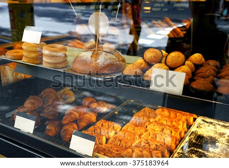 Modern bakery with different kinds of cakes and buns