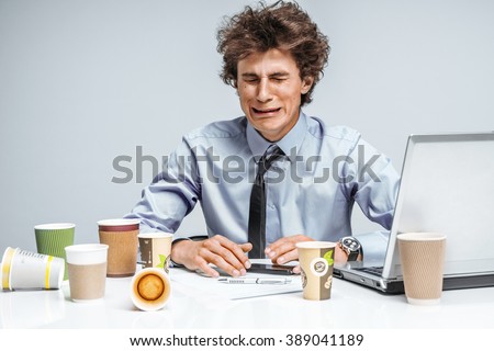 Crying man. Negative emotion facial expression feeling. Modern office man at working place, depression and crisis concept