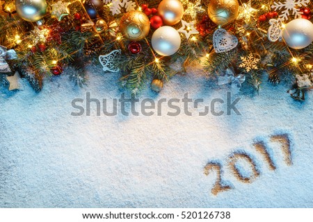 Christmas fir tree with decoration on snowy background. Merry Christmas and Happy New Year!! Top view.
