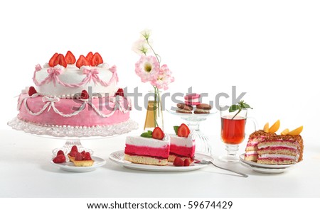 stock photo Luxury composition with a pie tea fruit cakes and flowers