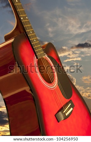 guitar and sunset closeup
