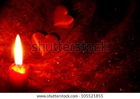red candles and hearts abstract background in night