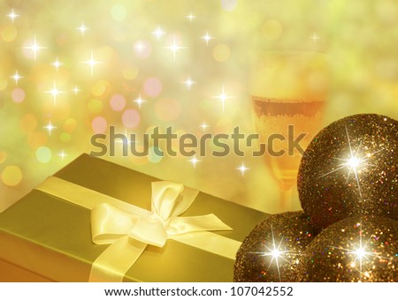 Christmas golden gift and champagne with bauble abstract design