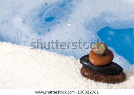foam , blue water , towel abstract bath background