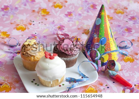 Birthday muffins party on pink background