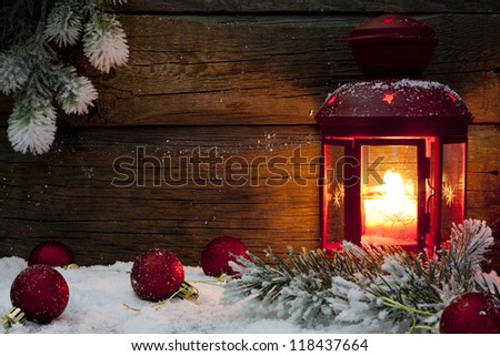 [Obrazek: stock-photo-christmas-lantern-with-baubl...437664.jpg]